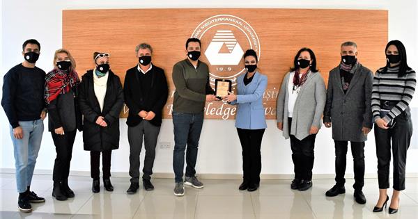 EMU Rector’s Office Presents a Plaque of Appreciation to Famous Producer  Emre Oskay